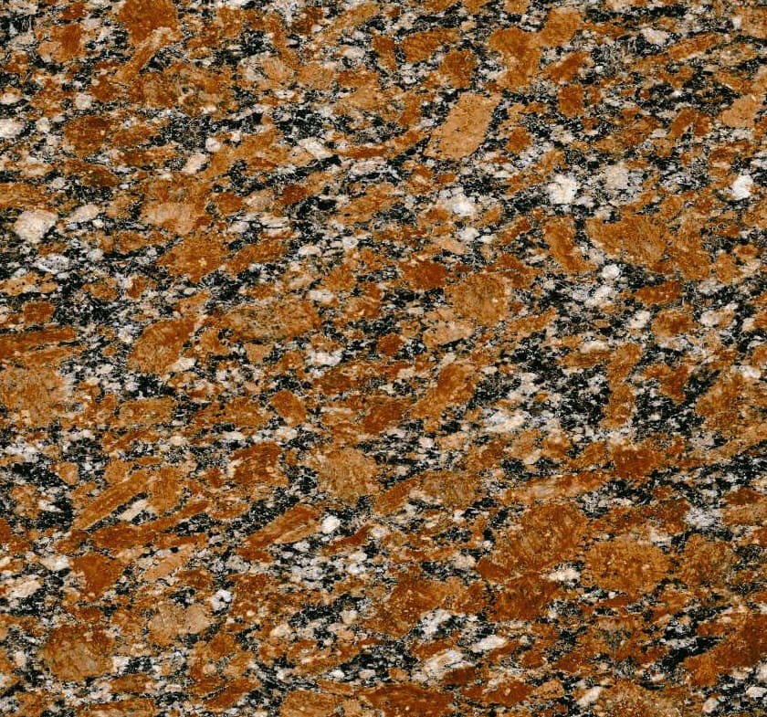 Granite-look ceramic surface with dense warm red speckle.