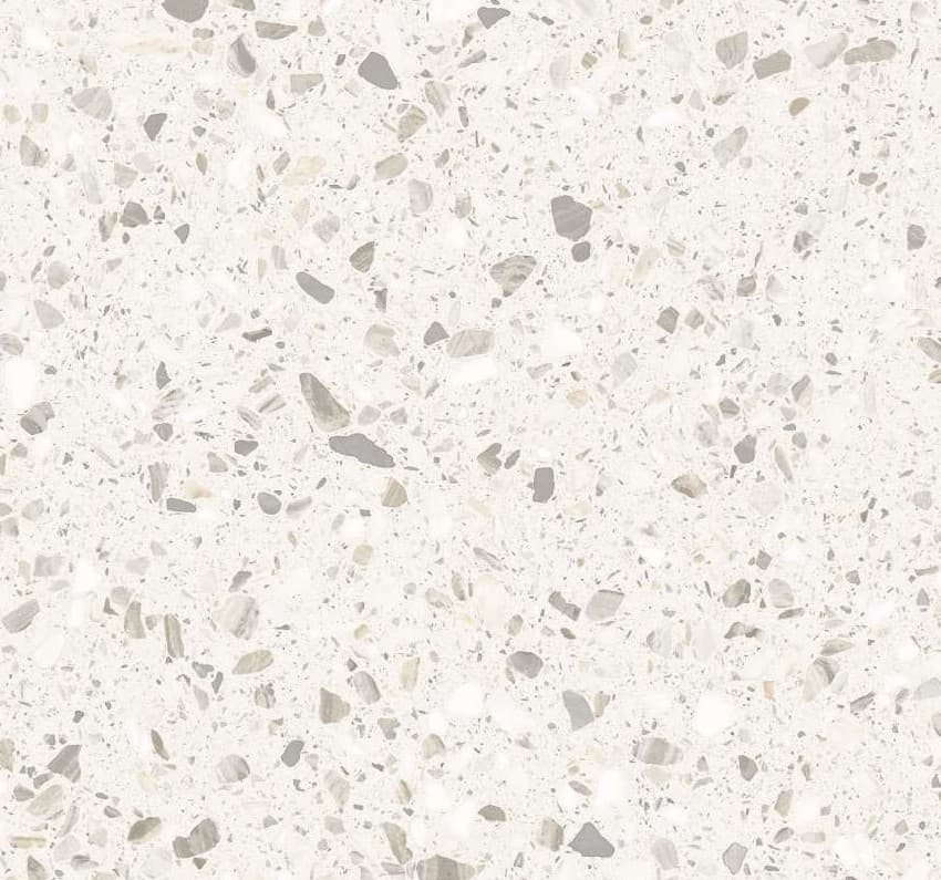 White terrazzo-look ceramic surface with dispersed aggregate.